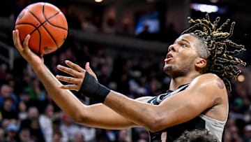 Orchard Lake St. Mary's Trey McKenney scores against East Lansing during the third quarter in the Division 1 state semifinal on Friday, March 14, 2025, at the Breslin Center in East Lansing.