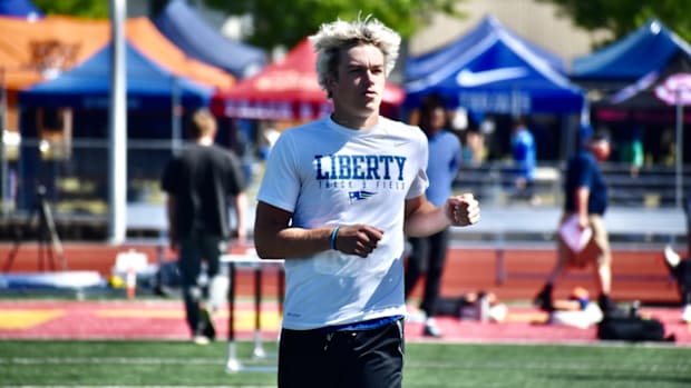Liberty of Issaquah's Sutton Flint ran into difficulty in the finals of the Class 3A 110-meter hurdles, but recovered to win.
