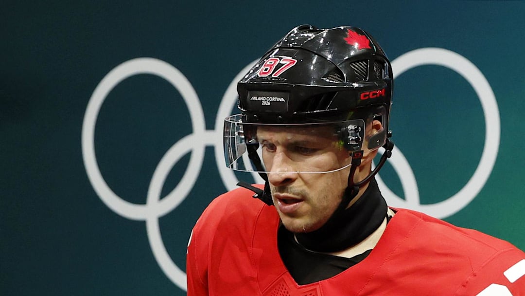 Feb 18, 2026; Milan, Italy; Sidney Crosby of Canada walks out to the ice before a men's ice hockey quarterfinal during the Milano Cortina 2026 Olympic Winter Games at Milano Santagiulia Ice Hockey Arena. Mandatory Credit: Geoff Burke-Imagn Images