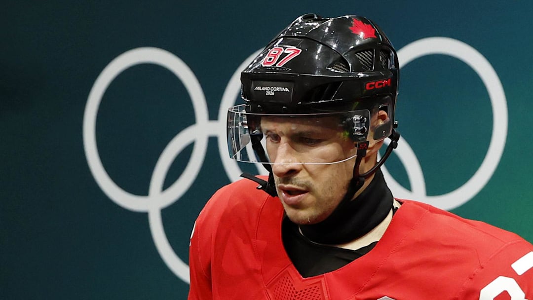 Feb 18, 2026; Milan, Italy; Sidney Crosby of Canada walks out to the ice before a men's ice hockey quarterfinal during the Milano Cortina 2026 Olympic Winter Games at Milano Santagiulia Ice Hockey Arena. Mandatory Credit: Geoff Burke-Imagn Images