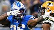 Detroit Lions running back Jahmyr Gibbs (26) celebrates picking up a first down against the Green Bay Packers last season.