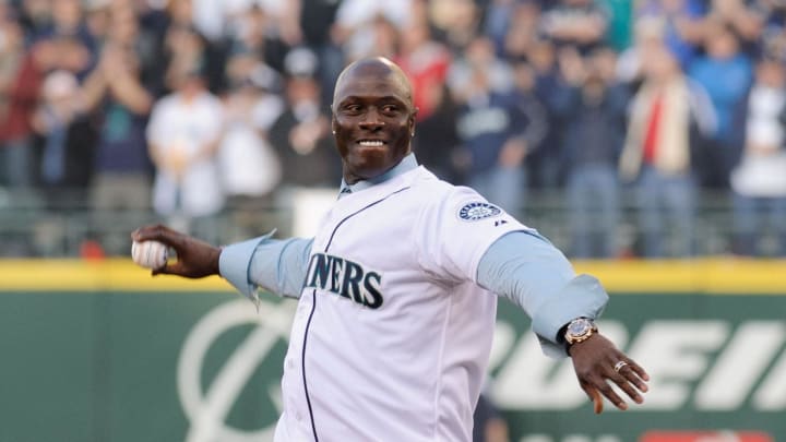 Seattle Mariners former player Mike Cameron throws out the first pitch prior to the game against the Oakland Athletics at Safeco Field. Oakland defeated Seattle 4-0.