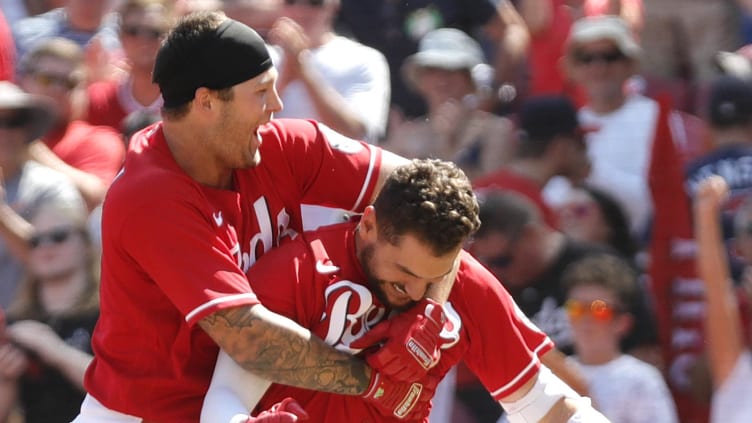 Cincinnati Reds right fielder Albert Almora Jr. (right) celebrates with Nick Senzel.