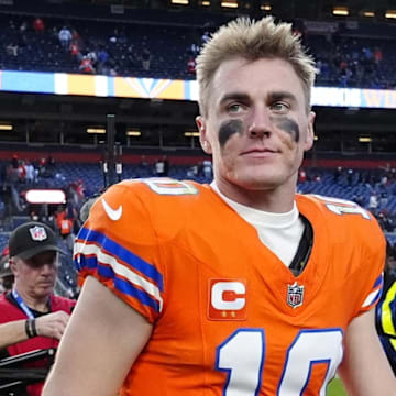 Oct 26, 2025; Denver, Colorado, USA;  Denver Broncos quarterback Bo Nix (10) looks on after the game against the Dallas Cowboys at Empower Field at Mile High. Mandatory Credit: Ron Chenoy-Imagn Images