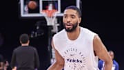 Mikal Bridges warms up against the Detroit Pistons. 