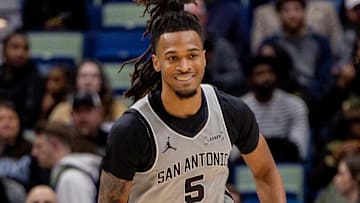 Dec 8, 2025; New Orleans, Louisiana, USA;  San Antonio Spurs guard Stephon Castle (5) brings the ball up court against the New Orleans Pelicans during the first half at Smoothie King Center. Mandatory Credit: Stephen Lew-Imagn Images