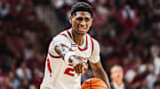 Billy Richmond (24) holds the ball against Lipscomb. The Razorbacks won 76-60. 