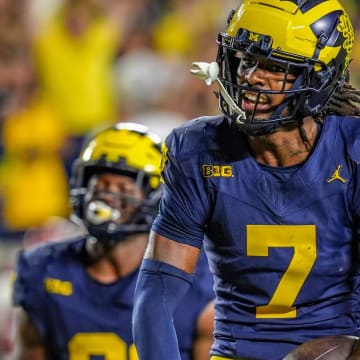 Michigan defensive back Makari Paige (7) runs through the end zone after he thought he made an interception against Fresno State during the second half at Michigan Stadium in Ann Arbor on Saturday, Aug. 31, 2024.