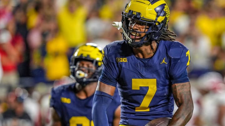 Michigan defensive back Makari Paige (7) runs through the end zone after he thought he made an interception against Fresno State during the second half at Michigan Stadium in Ann Arbor on Saturday, Aug. 31, 2024.