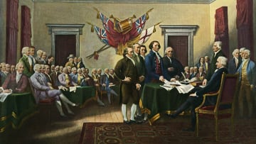 Painting showing Thomas Jefferson, John Adams, Roger Sherman, Robert Livingston, and Benjamin Franklin presenting the first draft of the Declaration of Independence to the Second Continental Congress.