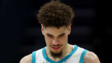 LaMelo Ball #1 of the Charlotte Hornets walks the court against the Miami Heat.