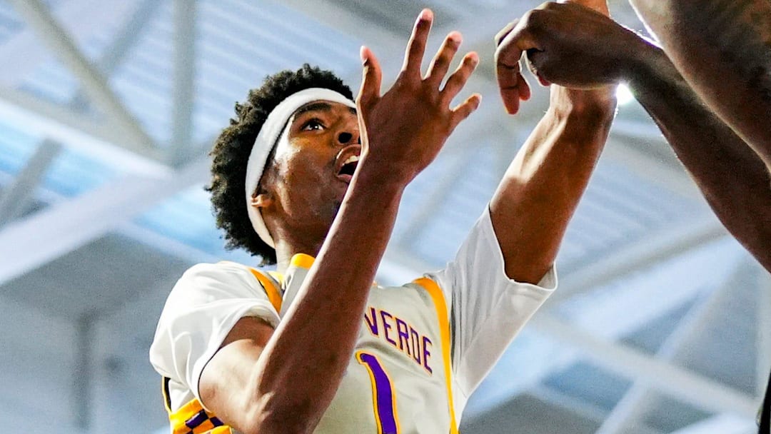 Montverde Academy Eagles forward Joe Philon (1) shoots the ball as Gillion Academy Lions center Marcis Ponder (11) guards him during the second quarter of a City of Palms Classic Signature Series game at Suncoast Credit Union Arena in Fort Myers, Fla., on Friday, Dec. 19, 2025.