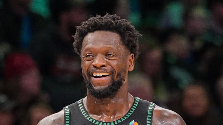 Feb 9, 2026; Minneapolis, Minnesota, USA; Minnesota Timberwolves forward Julius Randle (30) and guard Anthony Edwards (5) laugh after a timeout against the Atlanta Hawks in the fourth quarter at Target Center. Mandatory Credit: Brad Rempel-Imagn Images
