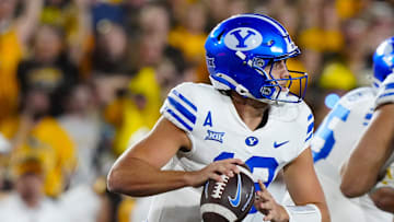 Jake Retzlaff steps up in the pocket against Wyoming