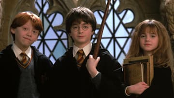 Ron Weasley (Rupert Grint), Harry Potter (Daniel Radcliffe), and Hermione Granger (Emma Watson) in Harry Potter and the Sorcerer's Stone.