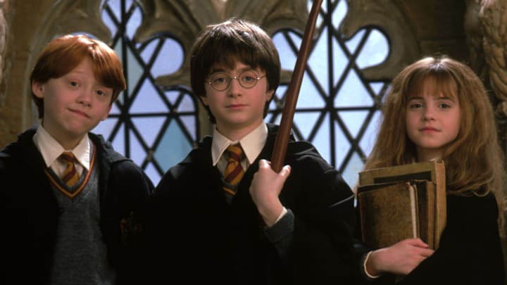 Ron Weasley (Rupert Grint), Harry Potter (Daniel Radcliffe), and Hermione Granger (Emma Watson) in Harry Potter and the Sorcerer's Stone.