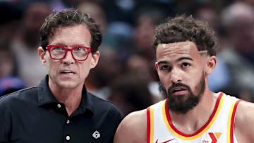 Atlanta Hawks head coach Quin Snyder and Trae Young #11 look on against the Dallas Mavericks.