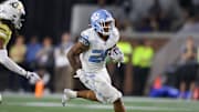 Oct 28, 2023; Atlanta, Georgia, USA; North Carolina Tar Heels running back Omarion Hampton (28) runs the ball against the Georgia Tech Yellow Jackets in the second half at Bobby Dodd Stadium at Hyundai Field. Mandatory Credit: Brett Davis-USA TODAY Sports