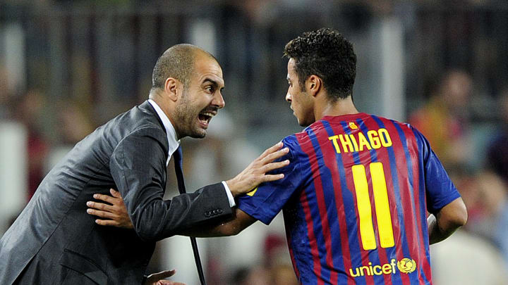 Barcelona's coach Josep Guardiola (L) sp