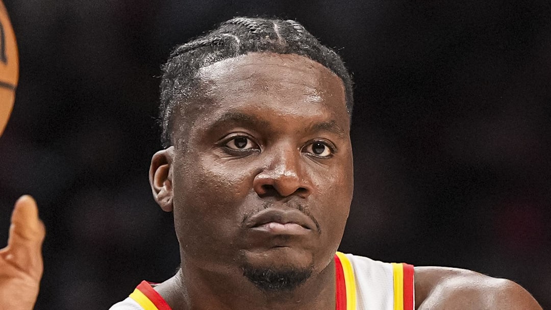 Jan 25, 2025; Atlanta, Georgia, USA; Atlanta Hawks center Clint Capela (15) inbounds the ball against the Toronto Raptors during the first half at State Farm Arena. Mandatory Credit: Dale Zanine-Imagn Images