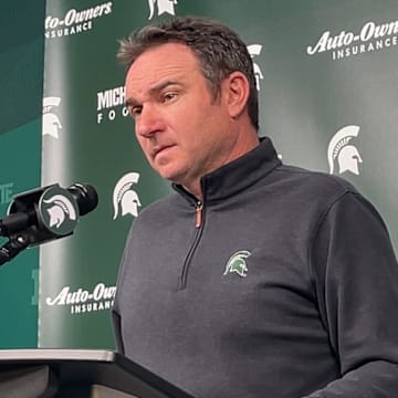 Michigan State head coach Jonathan Smith listens to a question being asked during a press conference on Nov. 10, 2025.
