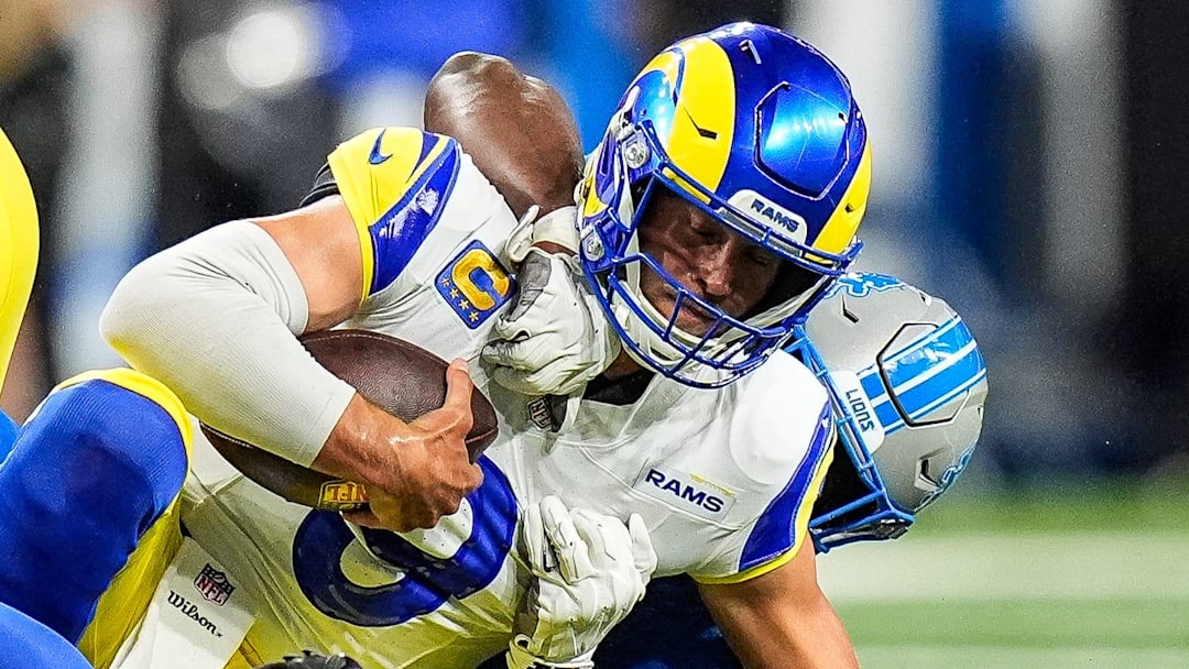 Los Angeles Rams quarterback Matthew Stafford (9) is sacked by Detroit Lions defensive end Levi Onwuzurike (91) 