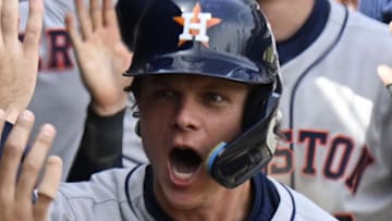 Houston Astros outfielder Jake Meyers (6) celebrates in the dugout after he hits a three run home run against the Chicago White Sox