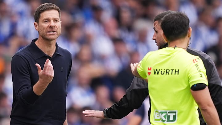 Xabi Alonso (left) was vocally frustrated after Dean Huijsen received a red card vs. Real Sociedad. 