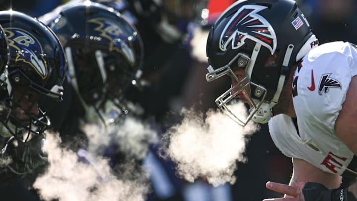 Dec 24, 2022; Baltimore, Maryland, USA; Atlanta Falcons center Drew Dalman (67) prepares to snap the ball during the first half against the Baltimore Ravens at M&T Bank Stadium. Dec 24, 2022; Baltimore, Maryland, USA; Atlanta Falcons center Drew Dalman (67) prepares to snap the ball during the first half against the Baltimore Ravens at M&T Bank Stadium.