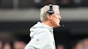 Nov 23, 2025; Paradise, Nevada, USA; Las Vegas Raiders quarterback Geno Smith (7) walks away from head coach Pete Carroll in a game against the Cleveland Browns during the fourth quarter at Allegiant Stadium. Mandatory Credit: Stephen R. Sylvanie-Imagn Images