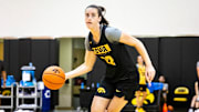 Iowa guard Caitlin Clark dribbles during a summer NCAA women's basketball practice, Friday, July 29, 2022, at Carver-Hawkeye Arena in Iowa City, Iowa.