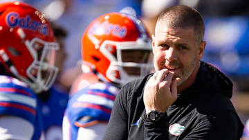 Florida Gators head coach Billy Napier watche this team warm up during the first half at Ben Hill Griffin Stadium in Gainesville, FL on Saturday, November 23, 2024. [Doug Engle/Gainesville Sun]