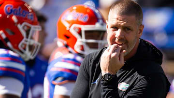 Florida Gators head coach Billy Napier watche this team warm up during the first half at Ben Hill Griffin Stadium in Gainesville, FL on Saturday, November 23, 2024. [Doug Engle/Gainesville Sun]