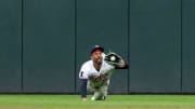 Minnesota Twins center fielder Byron Buxton (25) makes a diving catch to retire Detroit Tigers center fielder Riley Greene (31) in the first inning at Target Field in Minneapolis on June 2, 2024. 