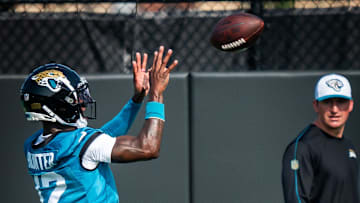 Jacksonville Jaguars wide receiver Travis Hunter (12) hauls in a pass while running routes during the seventh organized team activity at the Miller Electric Center in Jacksonville, Fla. Monday, June 2, 2025. [Doug Engle/Florida Times-Union]