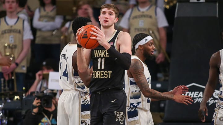 Feb 6, 2024; Atlanta, Georgia, USA; Wake Forest Demon Deacons forward Andrew Carr (11) grabs the ball against the Georgia Tech Yellow Jackets in the second half at McCamish Pavilion. Mandatory Credit: Brett Davis-USA TODAY Sports