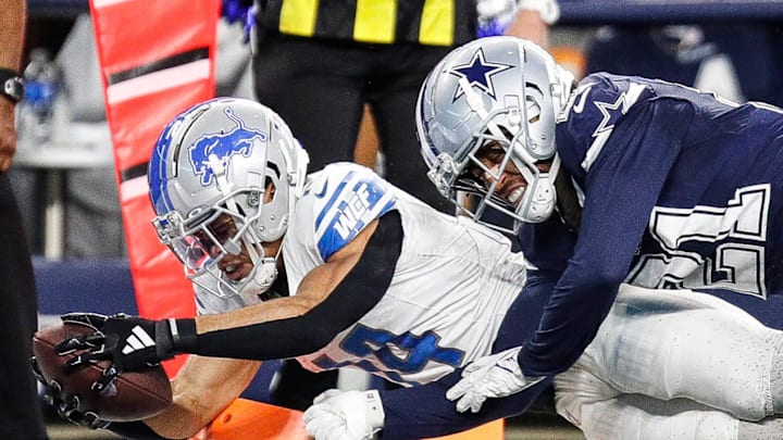 Detroit Lions wide receiver Amon-Ra St. Brown scores a touchdown against Cowboys 