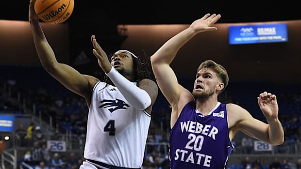 Nevada’s Tre’ Coleman shoots while taking on Weber State at Lawlor Events Center in Reno on Nov. 13, 2024.