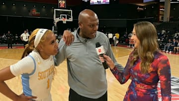 Coach Funchess and Aniya Gourdine 