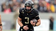 Oct 11, 2025; West Point, New York, USA; Army Black Knights quarterback Cale Hellums (3) carries the ball against the Charlotte 49ers during the first half at Michie Stadium. Mandatory Credit: Danny Wild-Imagn Images