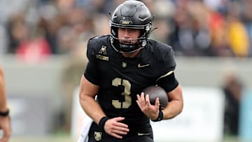 Oct 11, 2025; West Point, New York, USA; Army Black Knights quarterback Cale Hellums (3) carries the ball against the Charlotte 49ers during the first half at Michie Stadium. Mandatory Credit: Danny Wild-Imagn Images