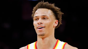 Dyson Daniels #5 of the Atlanta Hawks dribbles against the Miami Heat.