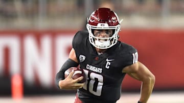 Sep 7, 2024; Pullman, Washington, USA; Washington State Cougars quarterback John Mateer (10) carries the ball against the Texas Tech Red Raiders in the second half at Gesa Field at Martin Stadium. Washington State Cougars won 37-16. Mandatory Credit: James Snook-Imagn Images