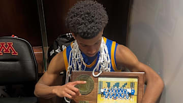 Wayzata guard Christian Wiggins celebrates the Class 4A state championship. 