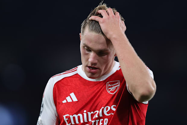 Viktor Gyökeres running his hand through his hair.