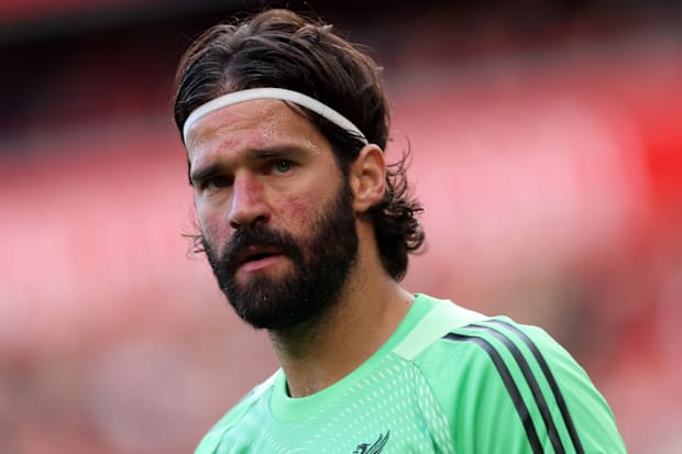 Alisson in action for Liverpool.