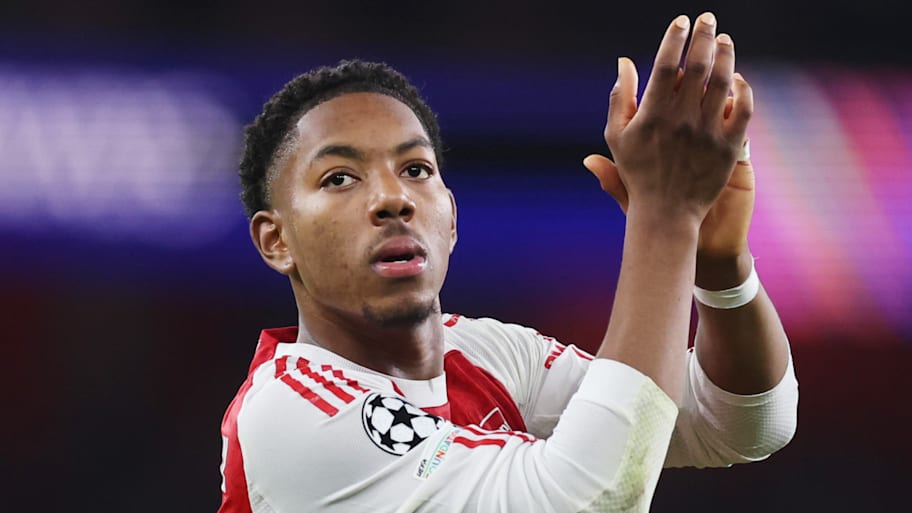 Myles Lewis-Skelly clapping.