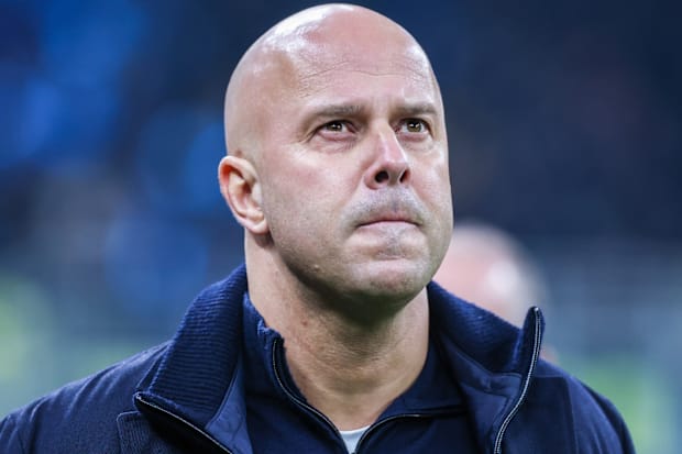 อาร์เน่ สล็อตด้วยสีหน้าหุบปาก