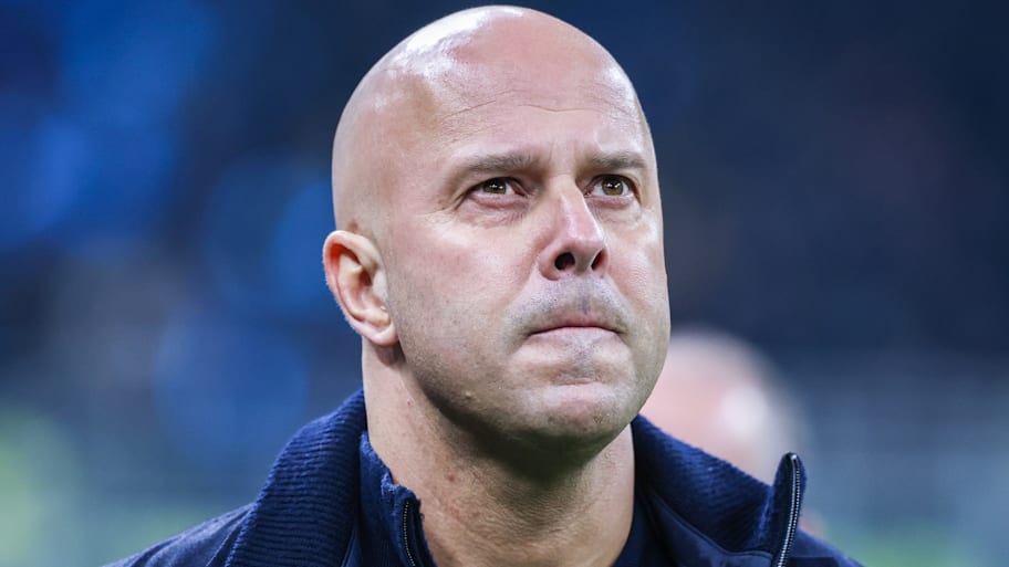 Arne Slot pursing his lips.