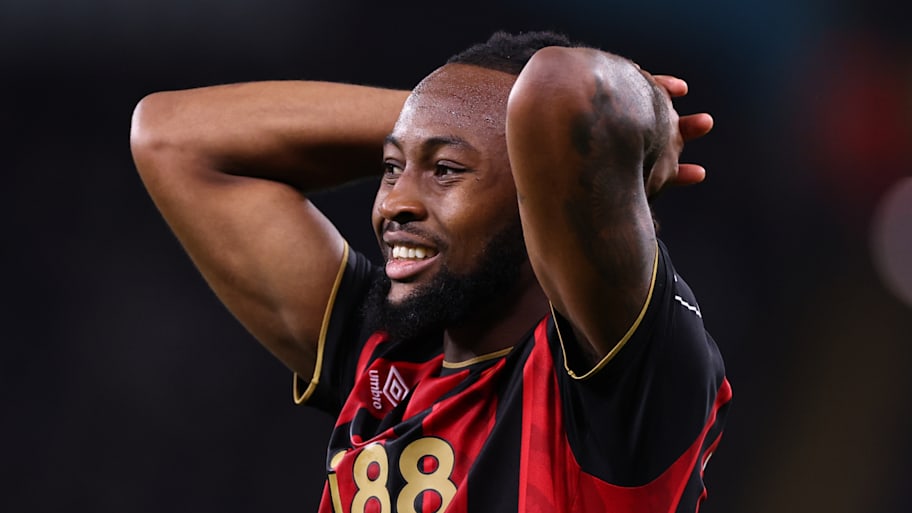 Antoine Semenyo with hands on his head.